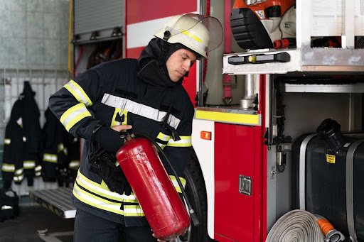 A man with fire extinguisher